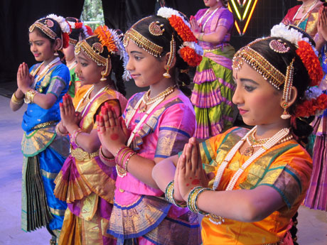 13 girls dancing at a dawali celebration